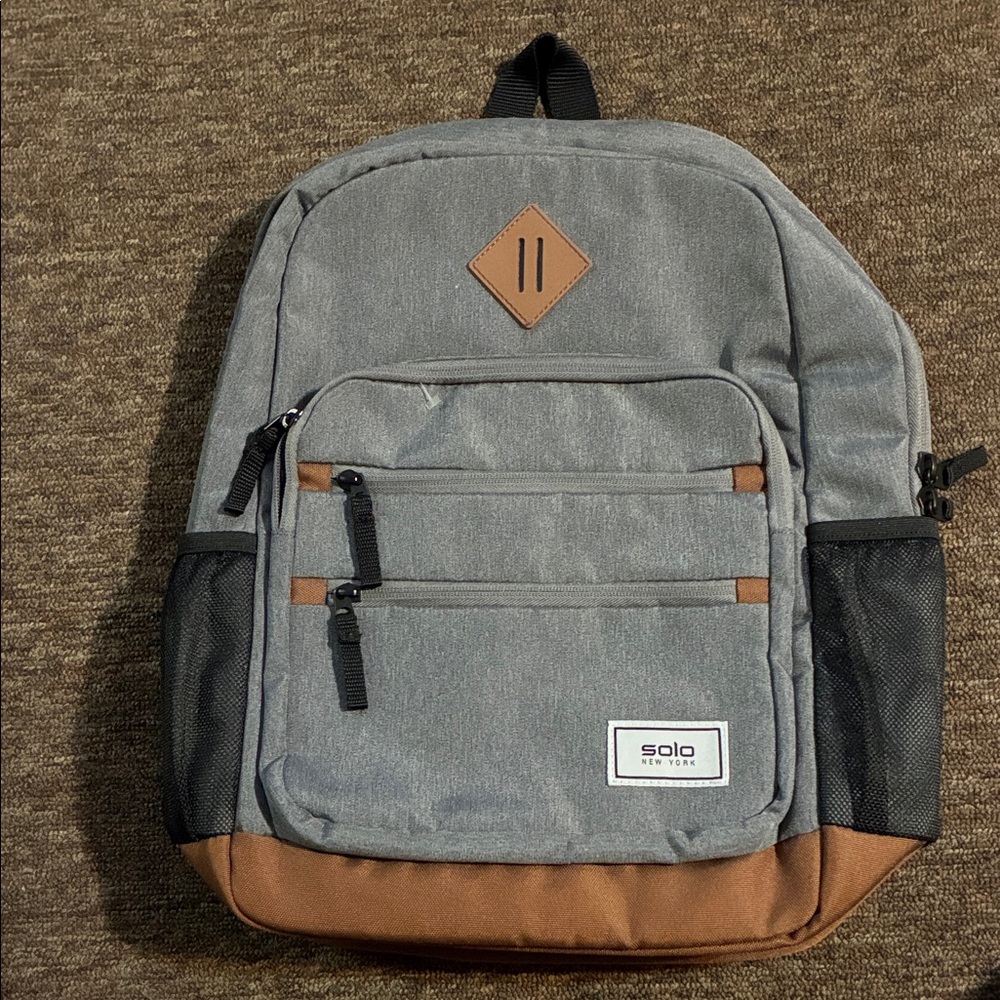 Solo Gray Backpack with Brown Accents